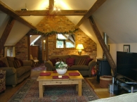Billys-Bothy-lounge-with-wood-burner-and-w-fi